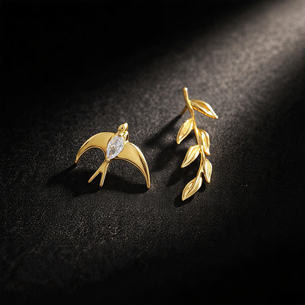 Asymmetrical Swallow & Olive Branch Earrings – 18K Gold Plated Bird Earrings with CZ